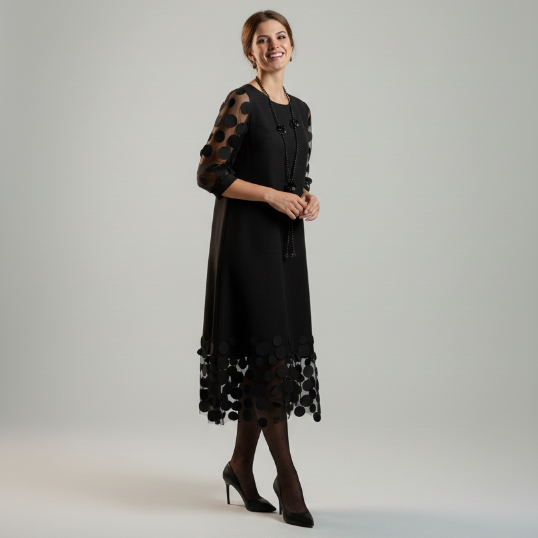 Beatrice | Vestido negro fluido con detalles en tul de lunares